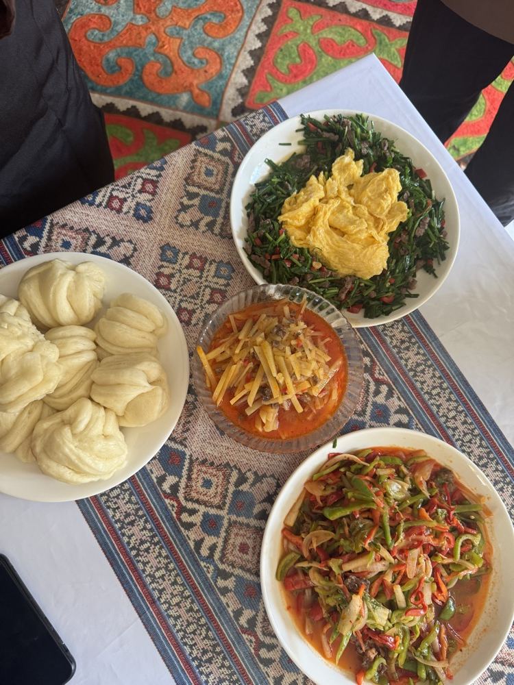 Dungan home cooking: steamed buns, egg with chives and vegetable dishes