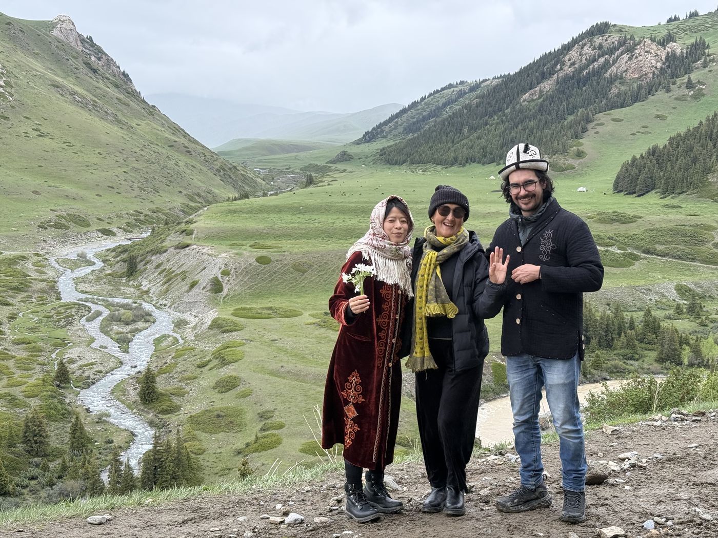 Guests above a winding river valley