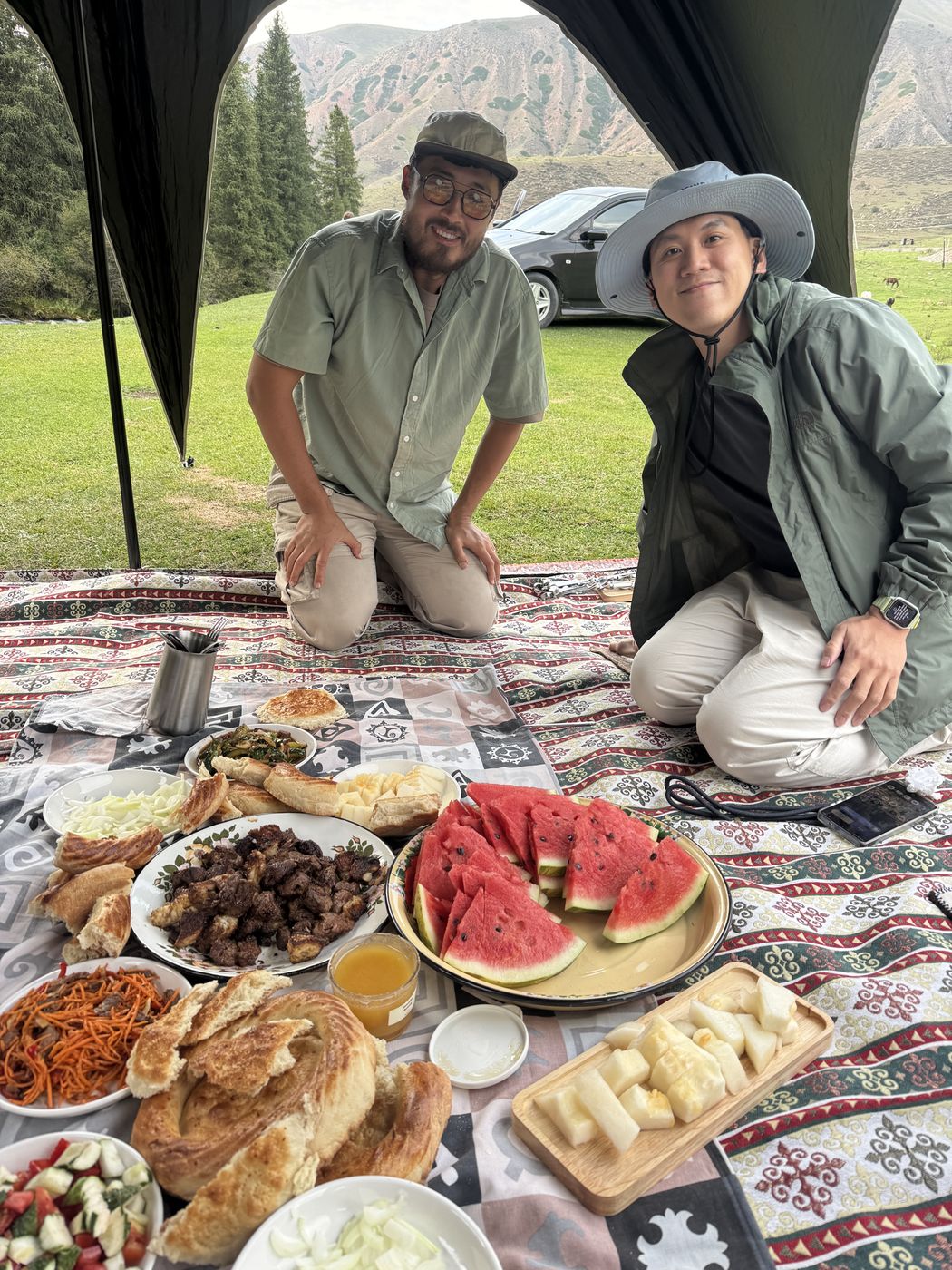 A mountain picnic with fruit and fresh bread