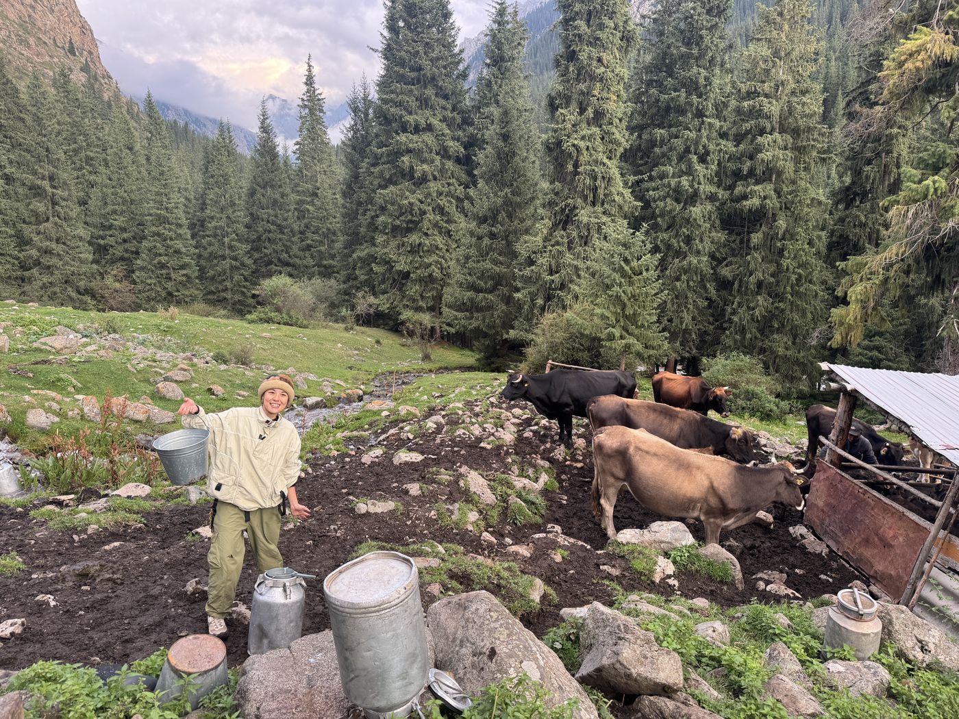 Carrying milk cans at a summer camp
