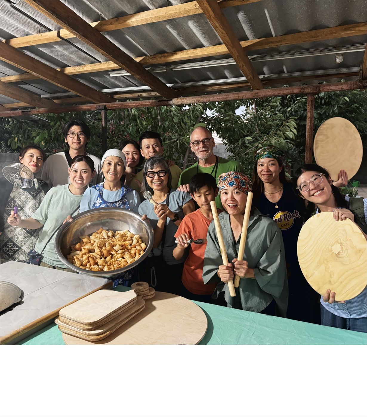 Guests holding fresh boorsok and bread